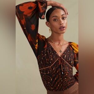 Anthropologie Orange and Black Patterned Blouse